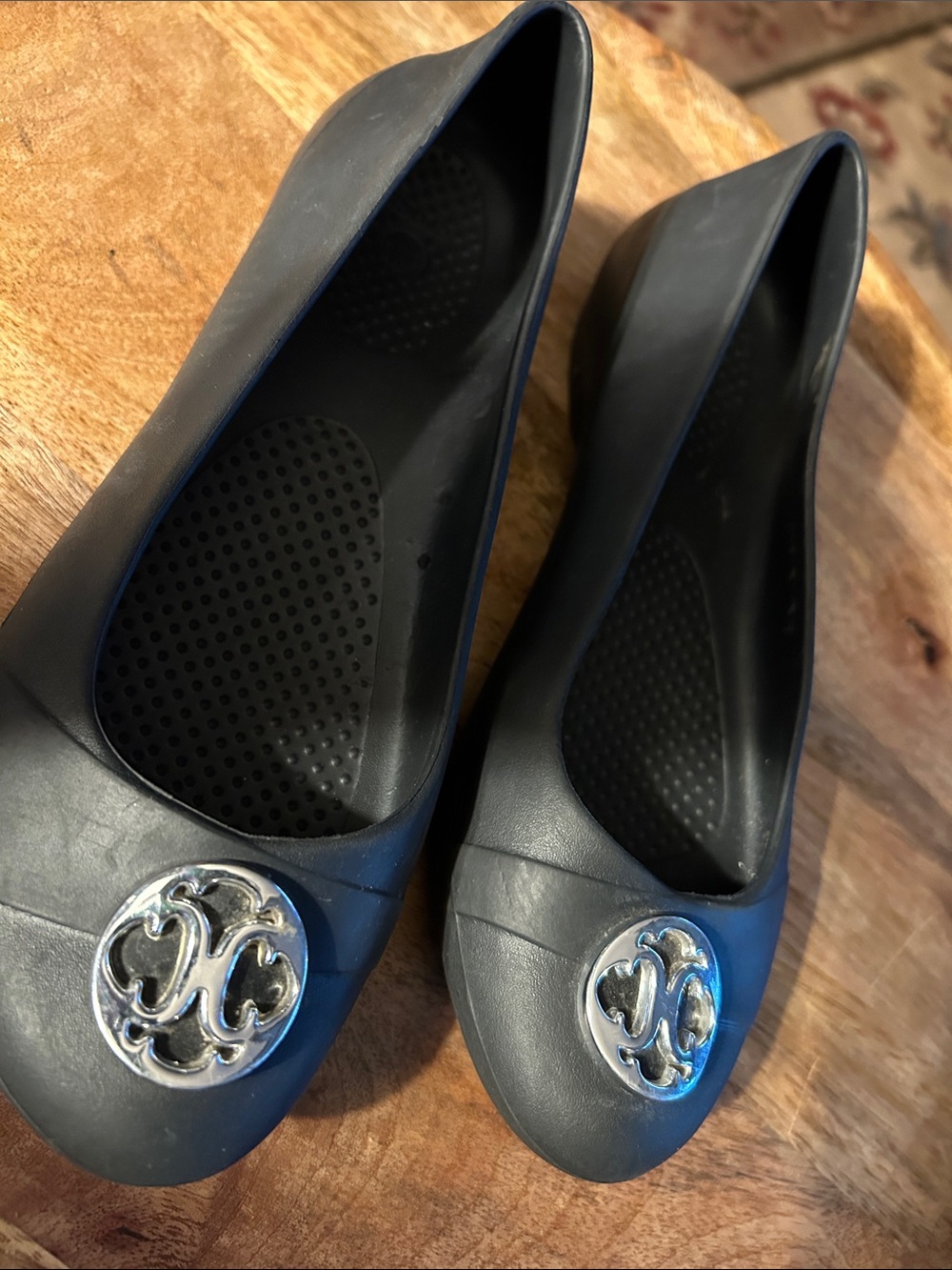 CROCS Women's Black Slip-On Flats with Silver Emblem
